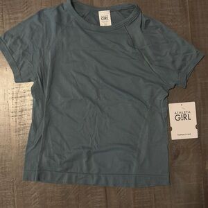 Brand new with tags xl child blue Athleta shirt (just bought in the wrong size)
